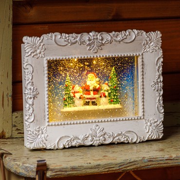Cadre à piles avec le Père Noël et des Bonhommes de neige, glitter scintillant en mouvement dans l'eau, 27 x h 21 cm, led blanc chaud