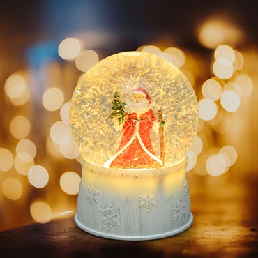 Sfera in vetro con base bianca a batteria con nevicata e Babbo Natale, h. 17 cm, led bianco caldo