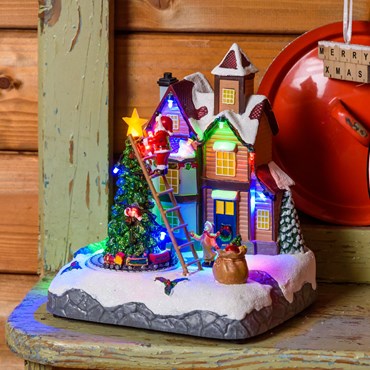 Battery operated Christmas Village, Christmas Tree and Santa on Ladder, Miniature Train h 21.5 cm, with Christmas Music