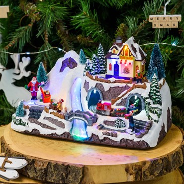 Battery operated Polyresin Christmas Village, Train in Tunner and Rotating Gift Boxes, h 19 cm, with Christmas Music