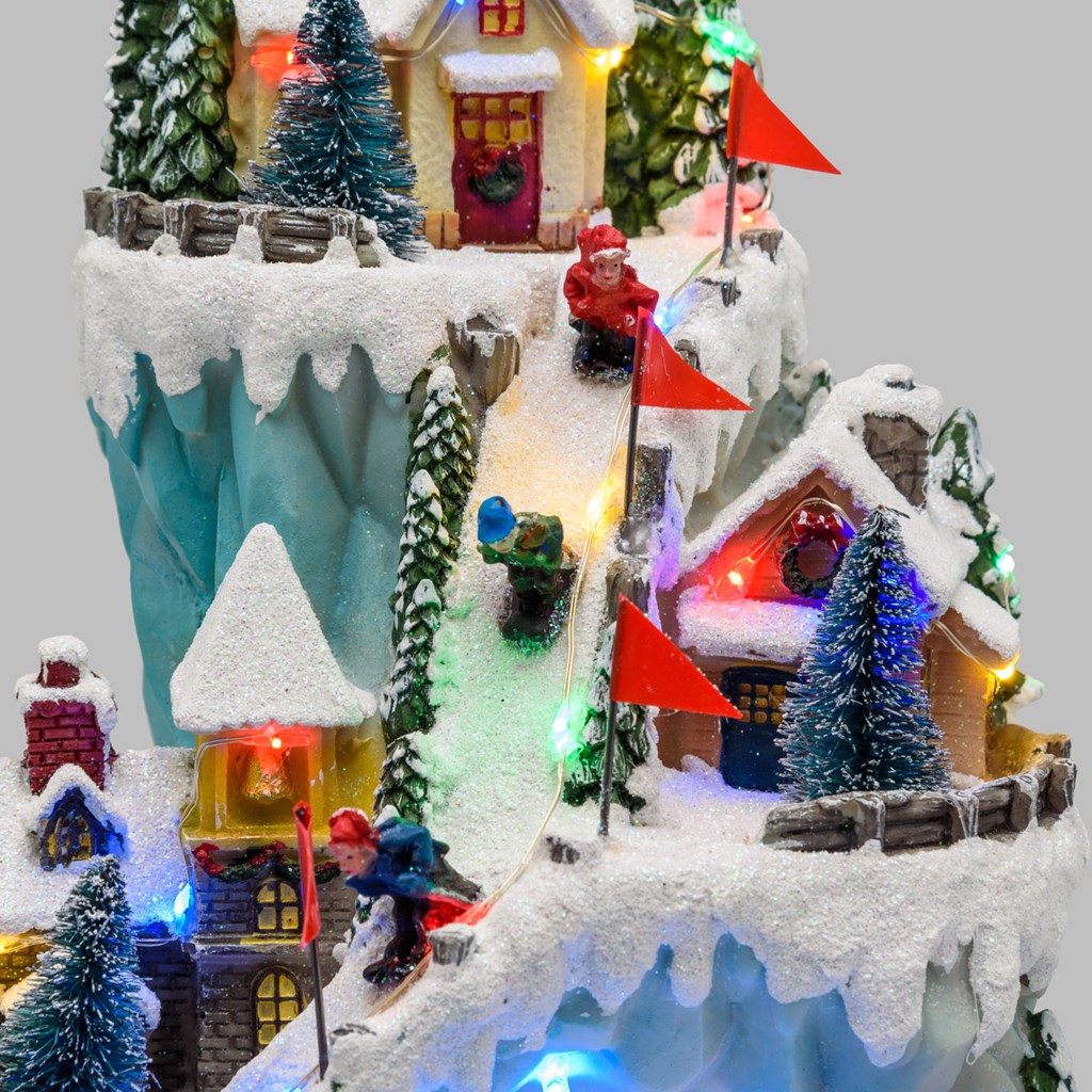 Battery operated Polyresin Christmas Village, Rotating Ice Skaters and  Skiers, h 26 cm, with Christmas Music - Holiday Villages